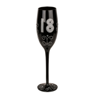 Must šampanjaklaas numbriga "18"